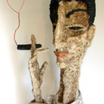 "Fumador enamorado", material reciclado, alto 90 cm, (2012)